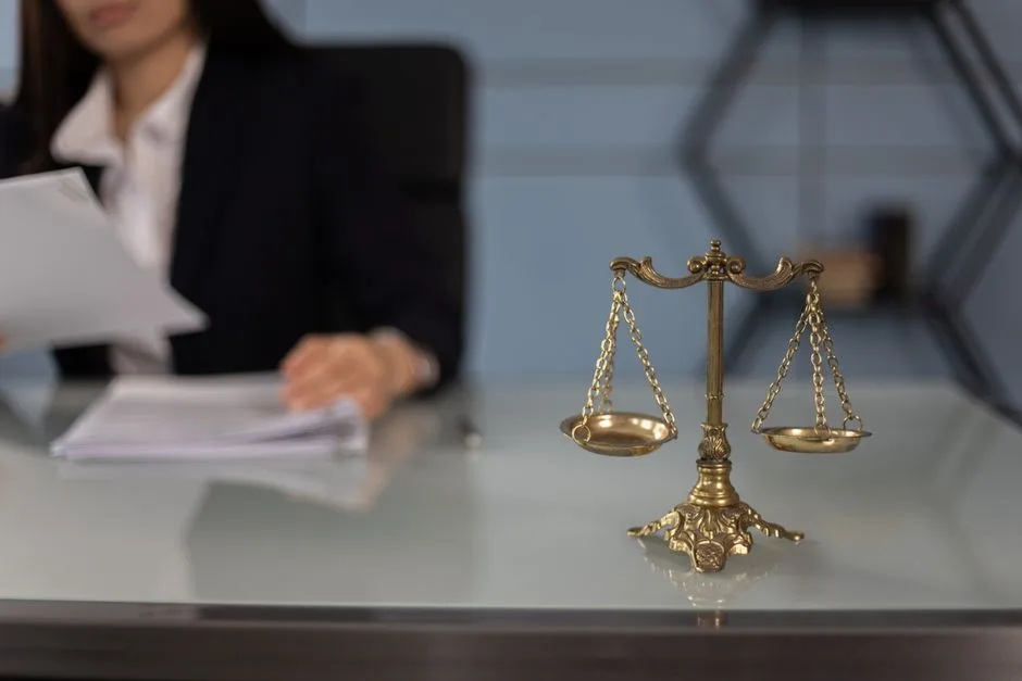 Balance scales on a desk in a professional office setting